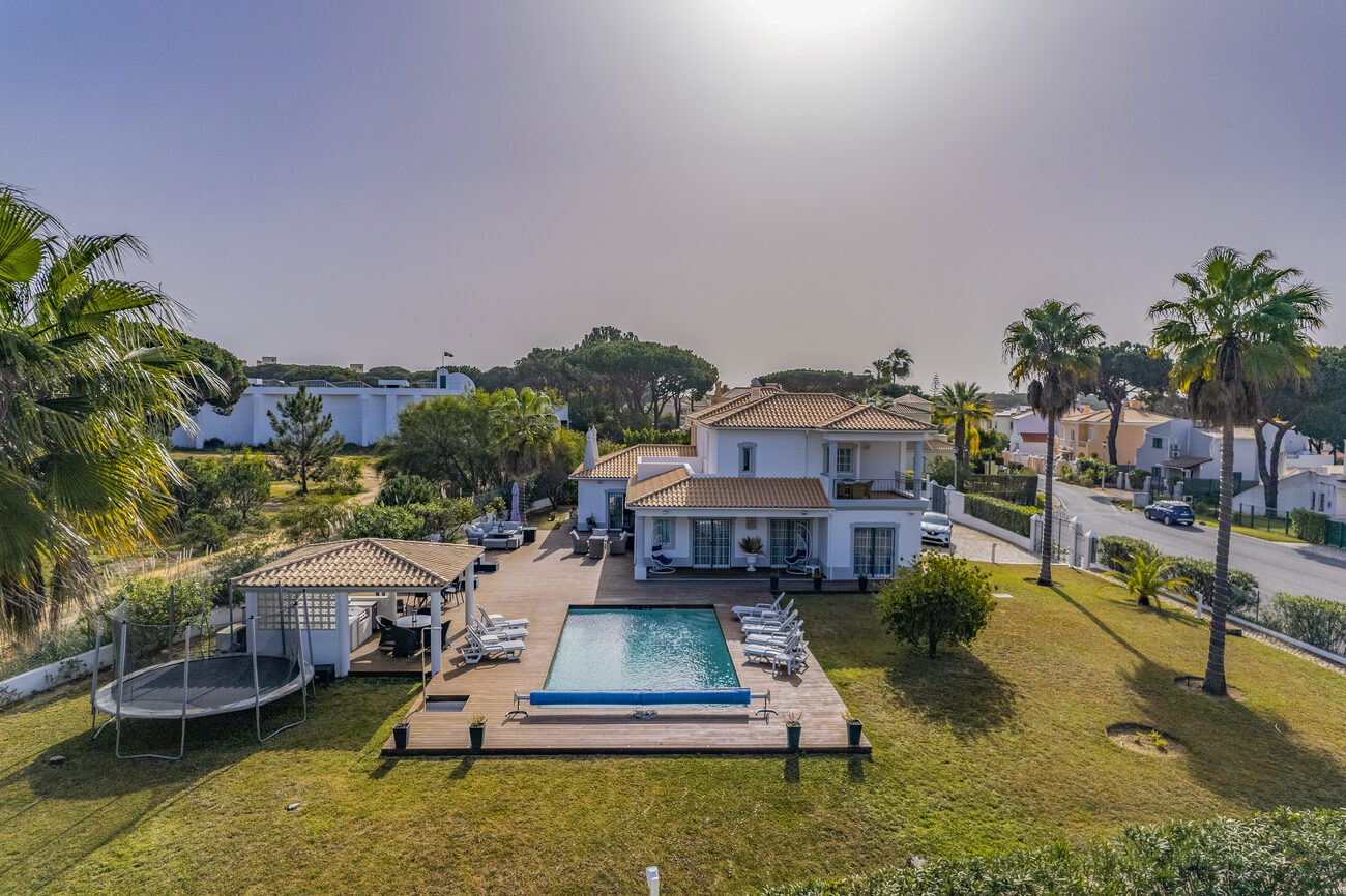 Aerial view of the retreat villa, pool and gardens in Vilamoura